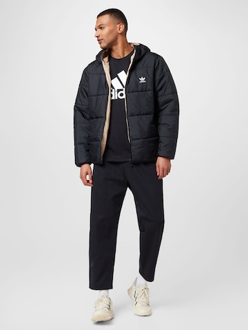 ADIDAS ORIGINALS Avsmalnet Bukse 'Graphics Campus Chino' i svart