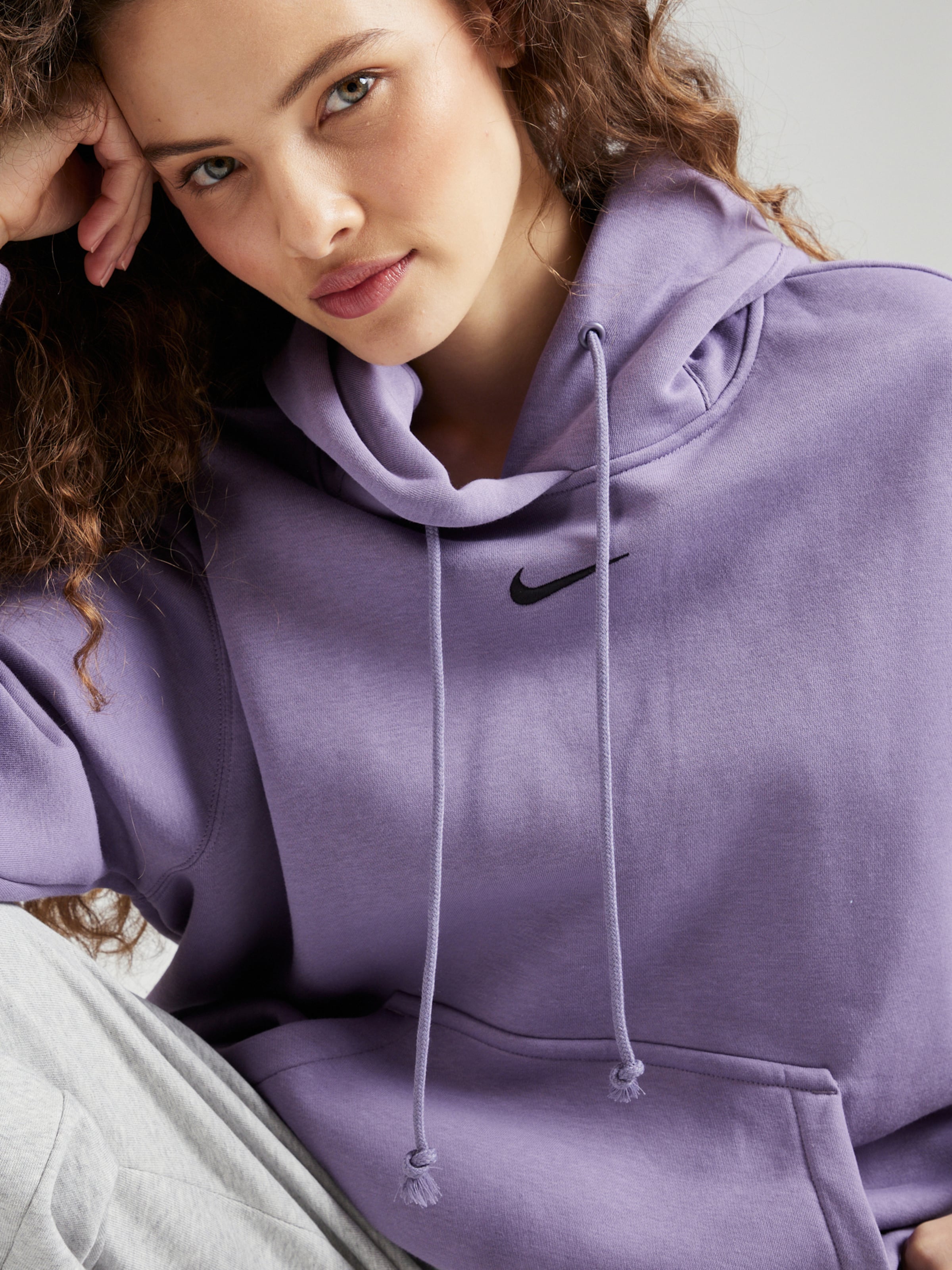Nike Sportswear Felpa Phoenix Fleece in Lilla ABOUT YOU