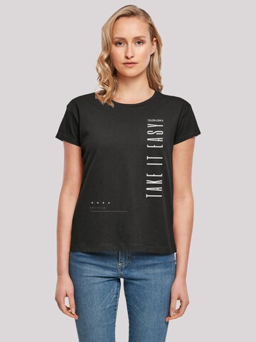 T-shirt 'Take It Easy' F4NT4STIC en noir : devant