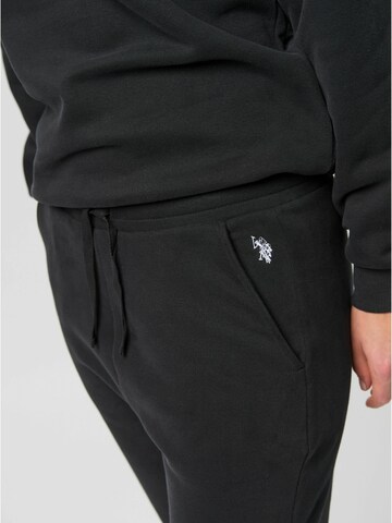 U.S. POLO ASSN. Tapered Housut 'India' värissä musta