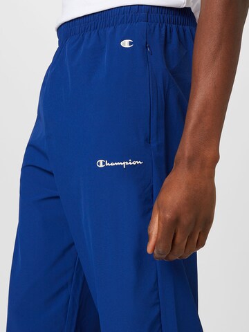 Champion Authentic Athletic Apparel Tapered Broek in Blauw