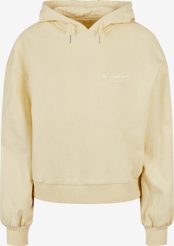Merchcode Sweatshirt 'Love Yourself First' in Geel: voorkant