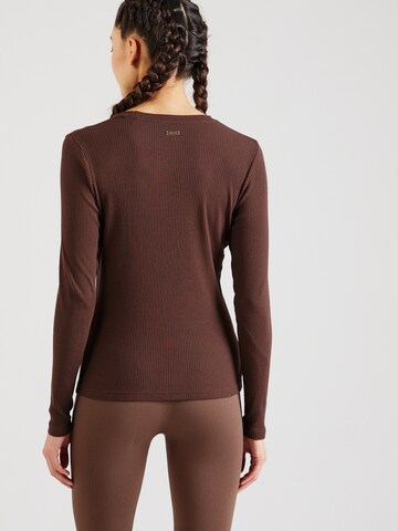 Athlecia Performance shirt 'Lankae' in Brown