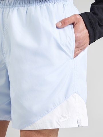 Largi Pantaloni 'WR' de la Nike Sportswear pe albastru