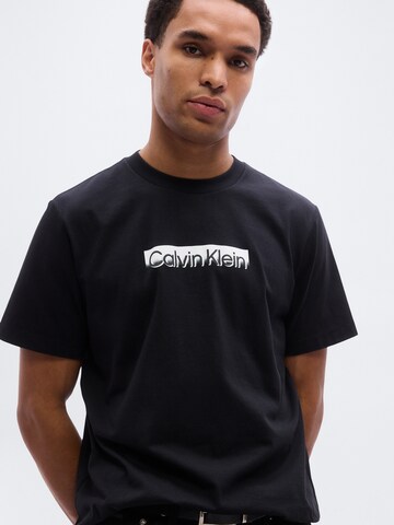 Calvin Klein Bluser & t-shirts i sort