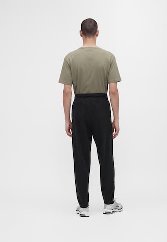 Effilé Pantalon 'Air' Nike Sportswear en noir