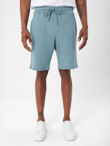 By Diess Collection Regular Trousers in Green: front