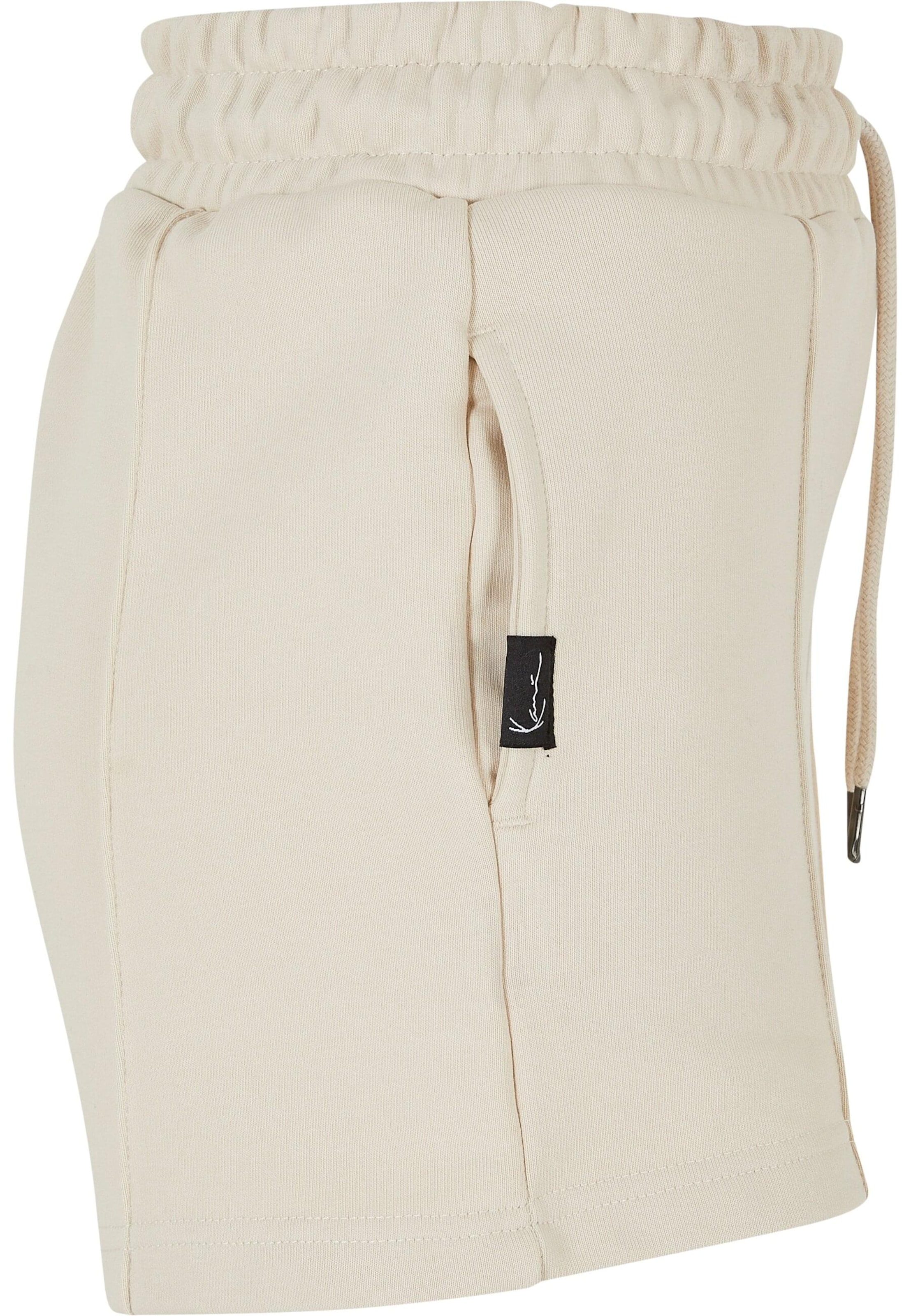 Karl Kani Regular Shorts in Beige