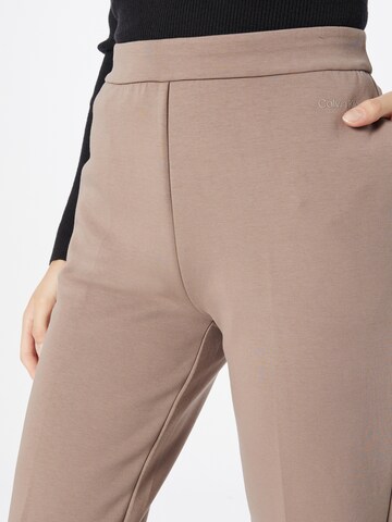 Calvin Klein Zwężany krój Spodnie w kolorze szary