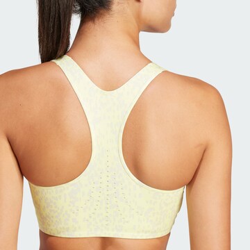 Bustino Reggiseno sportivo 'Truepurpose Power Impact Training Medium Support' di ADIDAS BY STELLA MCCARTNEY in giallo