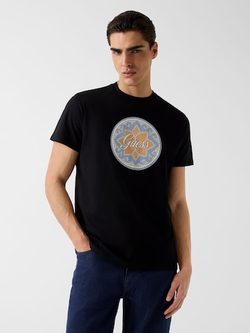 GUESS - Camiseta en negro: frente