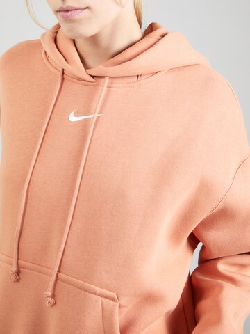 Nike Sportswear Bluzka sportowa 'Phoenix Fleece' w kolorze pomarańczowy