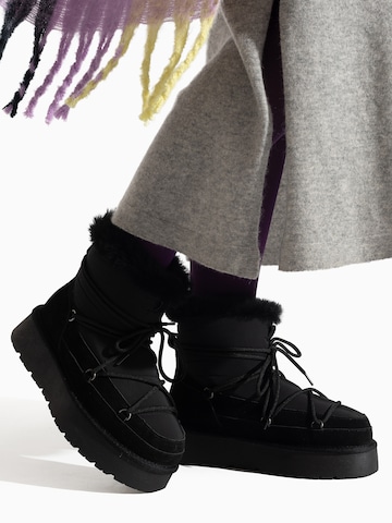 Gooce - Botas 'Warm' em preto: frente
