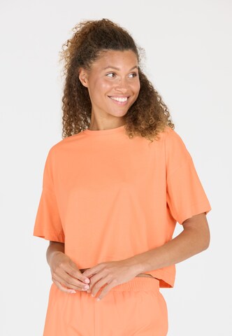 Athlecia Functioneel shirt 'Reynolds' in Oranje: voorkant
