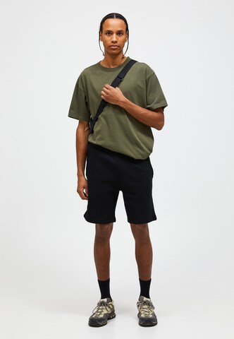 PEAK PERFORMANCE Regular Pants in Black