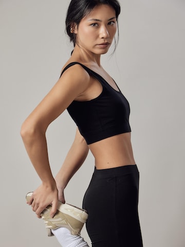 Top 'Sportivo' di OWN Off With Nature in nero
