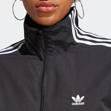 ADIDAS ORIGINALS Between-Season Jacket 'Adicolor Classics Lock-Up' in Black