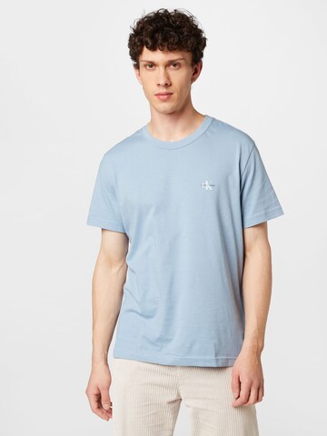 Tricou de la Calvin Klein Jeans pe albastru: față