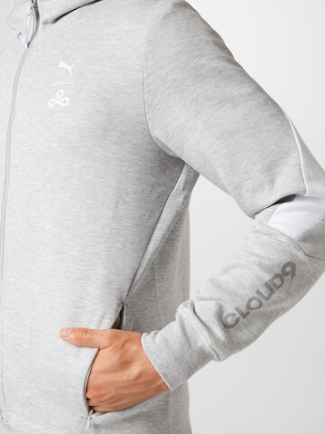 PUMA - Sudadera con cremallera deportiva en gris