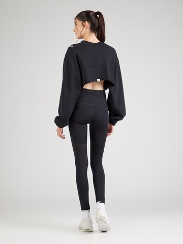 NIKE Skinny Παντελόνι φόρμας 'FAST' σε μαύρο