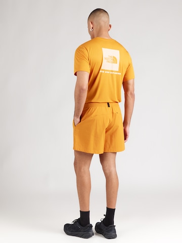 oranžinė THE NORTH FACE Laisvas Sportinės kelnės