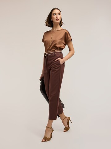 T-shirt mötivi en marron