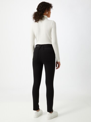 Skinny Pantaloni de la DKNY pe negru