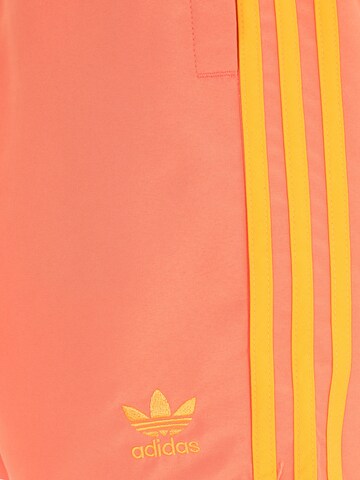 ADIDAS ORIGINALS Badshorts 'Adic' i orange