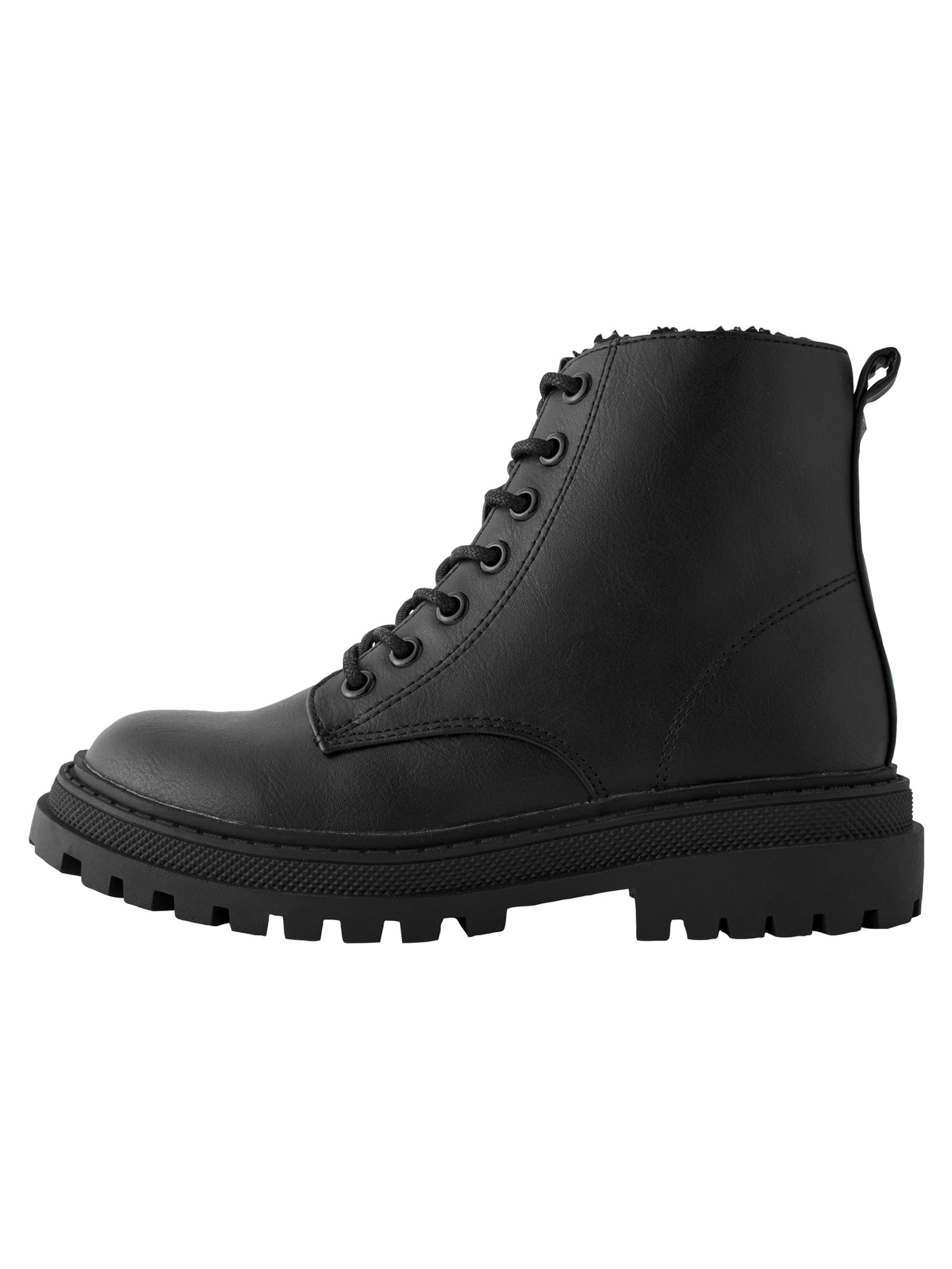 Next Saabas, värv must: eest vaates