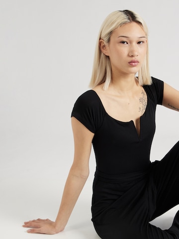 ABOUT YOU - Jumpsuit 'Tenea' en negro