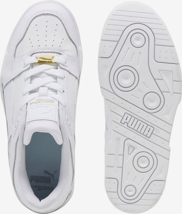 Baskets basses 'Slipstream' PUMA en blanc