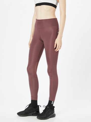 NIKE Skinny Workout Pants in Red: front