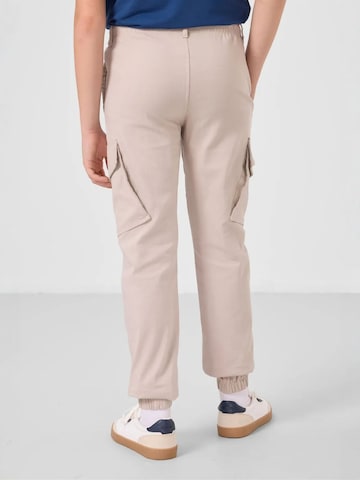 Pantalon 'TOMMY Kinder Cargo-Joggerhose' Tommy Life en gris