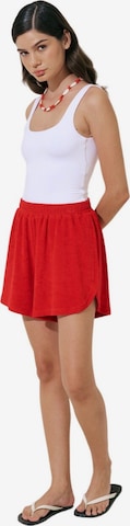 MANUKA Board shorts in Red: front