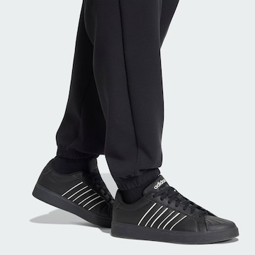 ADIDAS SPORTSWEAR Широка кройка Спортен панталон в черно