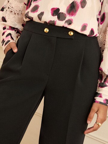 Wide leg Pantaloni con pieghe di love & roses in nero