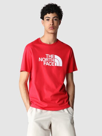 THE NORTH FACE - Ajuste regular Camiseta en rojo: frente