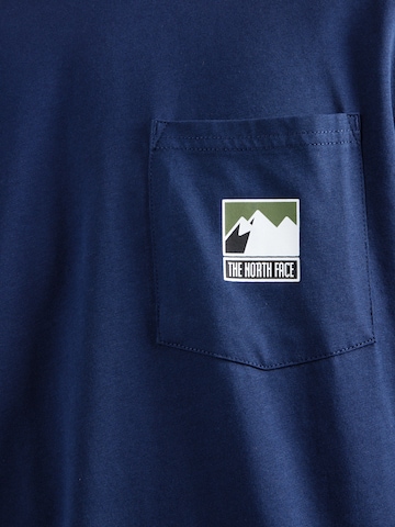 THE NORTH FACE Póló 'MOUNTAIN' - kék