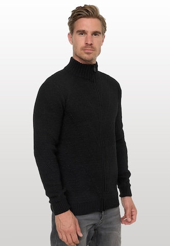 Rusty Neal Strickjacke in Schwarz: Vorderseite