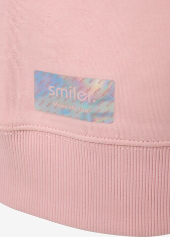 Sweat-shirt 'Happy' smiler. en rouge