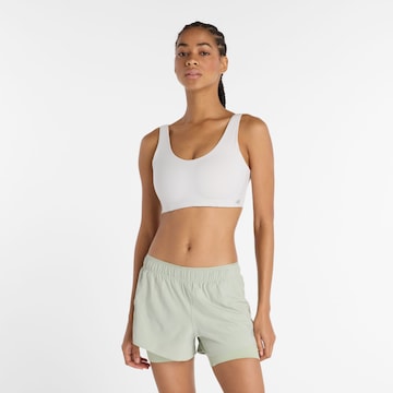 new balance - Soutien Bustier Soutien de desporto em branco: frente