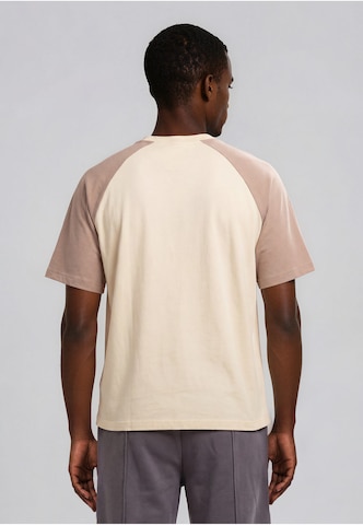 Maglietta di Karl Kani in beige