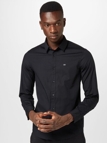 Coupe slim Chemise Calvin Klein en noir : devant