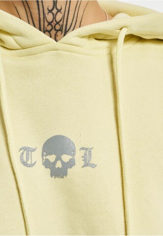 Sweat-shirt 'Caution' Thug Life en jaune