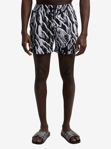 Carlo Colucci Board Shorts 'De Concini' in Black: front