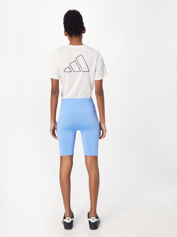 ADIDAS SPORTSWEAR - Skinny Calças de desporto 'Seamless' em azul