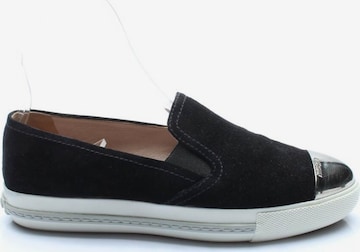 Miu Miu Flats & Loafers in 36 in Black: front