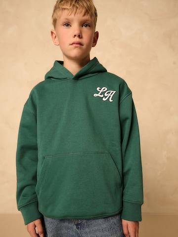 Sweat Next en vert : devant