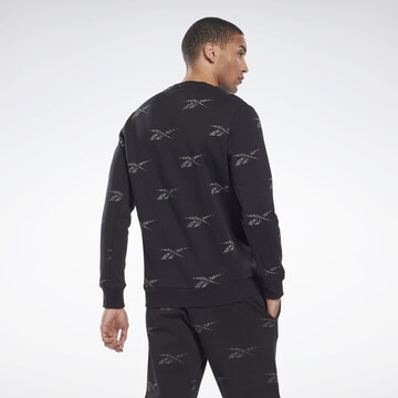 Reebok - Sweatshirt de desporto 'Identity Vector' em preto