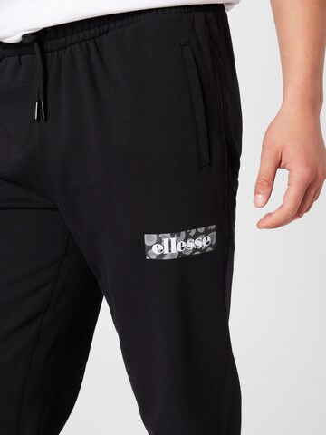 ELLESSE Tapered Trousers in Black